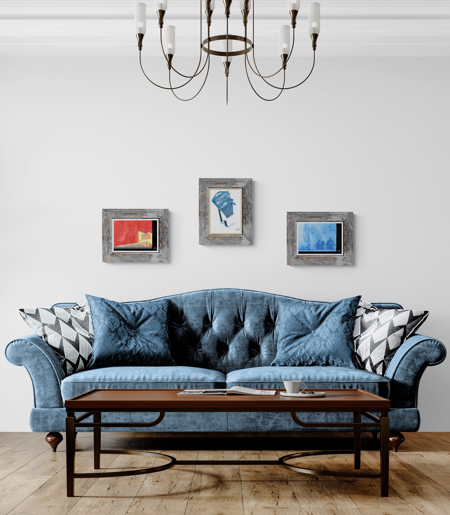 Trois affiches picturales perspectives architecture Rome au-dessus d'un canapé en jean dans un salon