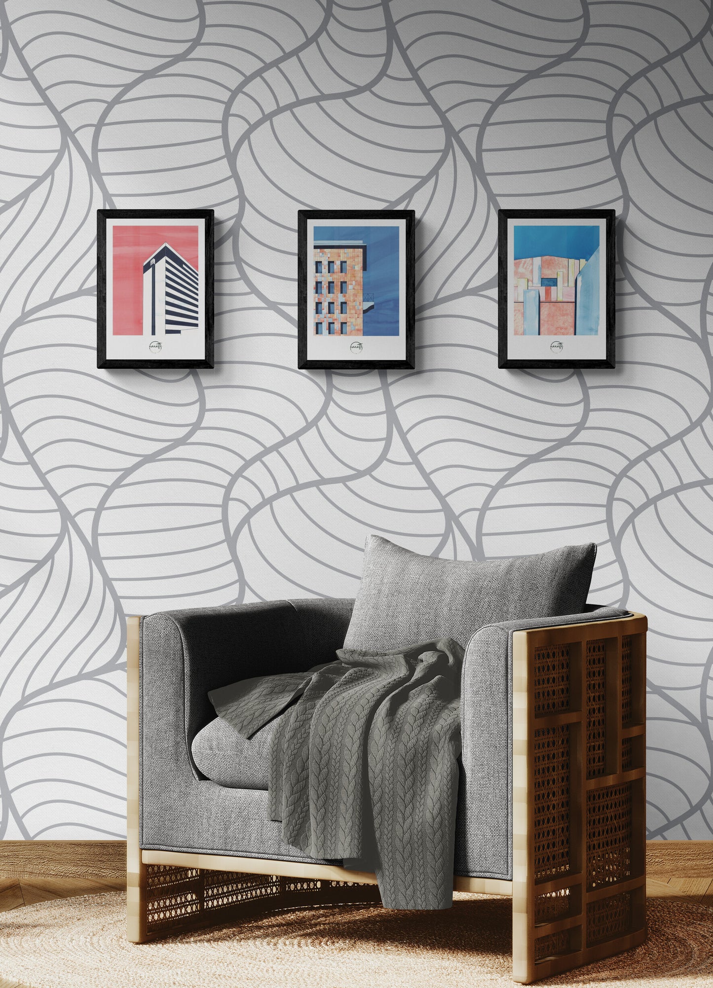 Trio affiches picturales bâtiments Berlin au-dessus d'un fauteuil en bois élégant avec papier peint à motifs